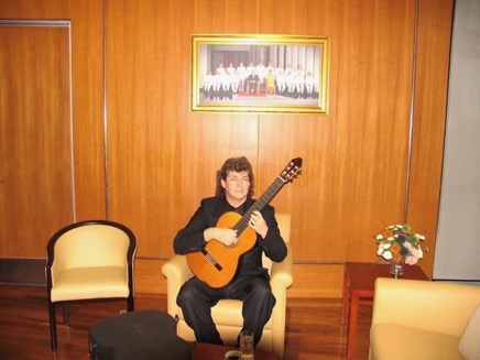 Presenting a guitar by German master luthier Gerhard Schnabl to HM King Bhumibol Adulyadej.jpg